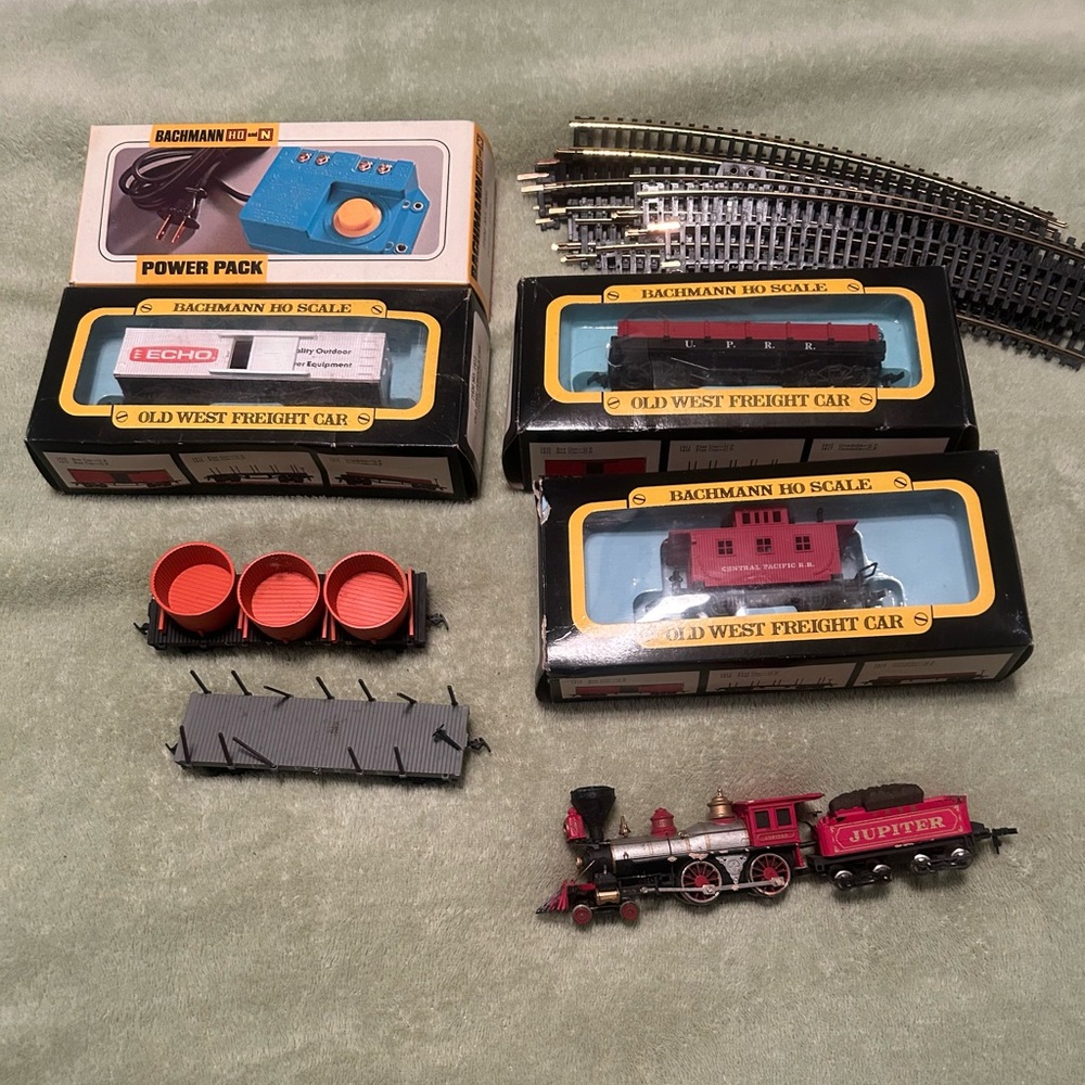 HO Scale model train cars, track and power pack